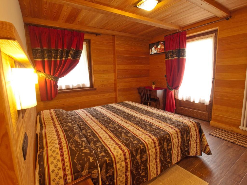 Villa Americana Chambres D'Hotes Champoluc Rom bilde